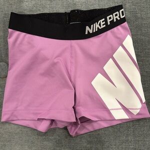 Purple or lavender Nike Pro Spandex running shorts, size S